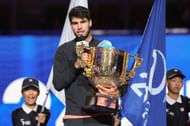 Carlos Alcaraz poses with the 2024 China Open title | Image Source: Getty